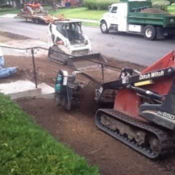 Bulldozers pushing dirt